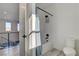 Clean bathroom with tub and shower at 1968 Regal Bluff Dr, Henderson, NV 89052