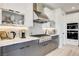 Modern kitchen features stainless steel appliances and white and gray cabinetry at 1968 Regal Bluff Dr, Henderson, NV 89052