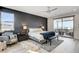 Spacious main bedroom with access to private balcony and ensuite bathroom at 1968 Regal Bluff Dr, Henderson, NV 89052