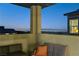 Spacious rooftop patio with seating and distant city views at 1968 Regal Bluff Dr, Henderson, NV 89052