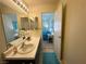 Bathroom with vanity and a view into bedroom at 2036 Mesquite Ln # 303, Laughlin, NV 89029