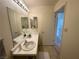 Bathroom with double vanity, mirror, and tiled floor at 2036 Mesquite Ln # 303, Laughlin, NV 89029