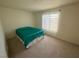 Bedroom with a king-size bed and window at 2036 Mesquite Ln # 303, Laughlin, NV 89029