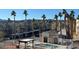 Community view with pool, parking, and mountain backdrop at 2036 Mesquite Ln # 303, Laughlin, NV 89029