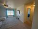 Hallway with view of bedroom and window at 2036 Mesquite Ln # 303, Laughlin, NV 89029
