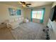 Spacious living room with sectional sofa, large window, and TV at 2036 Mesquite Ln # 303, Laughlin, NV 89029