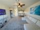 Open living area with sectional sofa, dining area, and kitchen view at 2036 Mesquite Ln # 303, Laughlin, NV 89029
