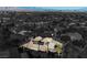 An aerial view showcasing a single-Gathering home with solar panels and a desert backdrop at 2149 Cedar River Ct, Henderson, NV 89044