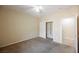 Carpeted bedroom with ceiling fan and closet at 2149 Cedar River Ct, Henderson, NV 89044
