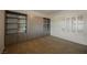 Bedroom with built-in shelves and window shutters at 2149 Cedar River Ct, Henderson, NV 89044