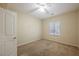 Bright bedroom with carpeted floor and ceiling fan at 2149 Cedar River Ct, Henderson, NV 89044