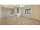 Open dining area with view into the living room and kitchen at 2149 Cedar River Ct, Henderson, NV 89044