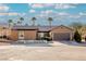 Single-story home with desert landscaping and a two-car garage at 2149 Cedar River Ct, Henderson, NV 89044