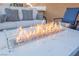 Modern fire pit perfect for ambiance and warmth on cool evenings at 2149 Cedar River Ct, Henderson, NV 89044