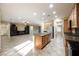 Open concept kitchen with island and stainless steel appliances at 2149 Cedar River Ct, Henderson, NV 89044