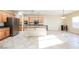 Kitchen boasts an island, stainless steel appliances, and light wood cabinets at 2149 Cedar River Ct, Henderson, NV 89044