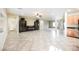 Bright living room featuring tile floors and a fireplace at 2149 Cedar River Ct, Henderson, NV 89044