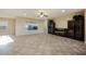 Spacious living room featuring tile floors and a built-in fireplace at 2149 Cedar River Ct, Henderson, NV 89044