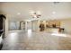 Spacious living room with an open floor plan and tile flooring at 2149 Cedar River Ct, Henderson, NV 89044