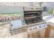 Stainless steel outdoor grill with side burner, perfect for summer barbecues at 2149 Cedar River Ct, Henderson, NV 89044