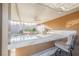 Outdoor kitchen with built-in grill and marble countertop at 2149 Cedar River Ct, Henderson, NV 89044