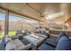 Covered patio with fire pit and seating area, great for outdoor living at 2149 Cedar River Ct, Henderson, NV 89044