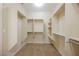 Large walk-in closet with hanging rods and shelves at 2149 Cedar River Ct, Henderson, NV 89044
