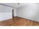 Simple bedroom with light wood flooring and an accent wall at 3151 Soaring Gulls Dr # 1170, Las Vegas, NV 89128