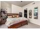 Bedroom showcasing a large bed, storage, and access to the closet at 353 E Bonneville Ave # 632, Las Vegas, NV 89101