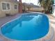 Inviting kidney-shaped pool, surrounded by a patio at 3659 Descanso St, Las Vegas, NV 89121