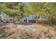 Backyard with a picnic table and mature trees at 376 N 15Th St, Las Vegas, NV 89101