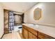 Bathroom with tub shower, vanity, and mirror at 376 N 15Th St, Las Vegas, NV 89101