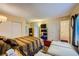 Main bedroom with a queen bed, red rug, and access to a second room at 376 N 15Th St, Las Vegas, NV 89101