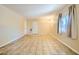 Open living room with tile floors and front door access at 376 N 15Th St, Las Vegas, NV 89101