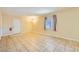 Open living room with tile floors and front door access at 376 N 15Th St, Las Vegas, NV 89101