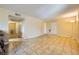 Open living room with tile floors and hallway access at 376 N 15Th St, Las Vegas, NV 89101