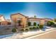 Single story home with landscaped yard and two car garage at 4119 Amberdale Ave, North Las Vegas, NV 89031