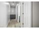 Hallway with linen closet and access to bedrooms and bathrooms at 4119 Amberdale Ave, North Las Vegas, NV 89031
