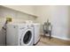 Laundry room with washer, dryer, and utility sink at 4119 Amberdale Ave, North Las Vegas, NV 89031
