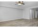 Spacious living room with hardwood floors and neutral walls at 4119 Amberdale Ave, North Las Vegas, NV 89031