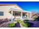Covered patio with brick pavers and ceiling fan at 4119 Amberdale Ave, North Las Vegas, NV 89031