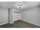 Bright bedroom with stylish flooring, modern ceiling fan, and closet space, perfect for relaxation at 4123 Redfield Ave, North Las Vegas, NV 89032