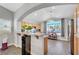 Bright kitchen featuring granite countertops, tile flooring, and stainless steel appliances at 4123 Redfield Ave, North Las Vegas, NV 89032