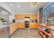 Spacious kitchen with stainless steel appliances and granite countertops at 4123 Redfield Ave, North Las Vegas, NV 89032