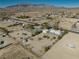 Aerial view of property showcasing large lot and mountain views at 561 Jarvis Rd, Pahrump, NV 89060