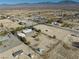 Aerial view showing home, expansive lot, and mountain backdrop at 561 Jarvis Rd, Pahrump, NV 89060