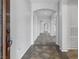 Bright foyer with arched doorways and neutral paint provides an open and airy feel at 5625 Galivan Vista St, North Las Vegas, NV 89081