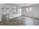 Spacious living area with recessed lighting, tile flooring, and a view of other rooms at 5625 Galivan Vista St, North Las Vegas, NV 89081