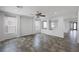 Open living space with decorative archways, neutral color palette, and tile flooring at 5625 Galivan Vista St, North Las Vegas, NV 89081