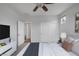 Tastefully decorated main bedroom featuring a ceiling fan and a closet with sliding doors at 5625 Galivan Vista St, North Las Vegas, NV 89081